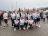 Gruppenfoto von allen Läuferinnen und Läufern mit einheitlichen Shirts.